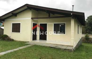 Imagem: A casa possui 3 Dormitórios, 1 Banheiro, 1 Vaga na garagem