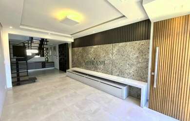 Imagem: A casa possui 5 Dormitórios, 5 Banheiros, 4 Vagas na garagem