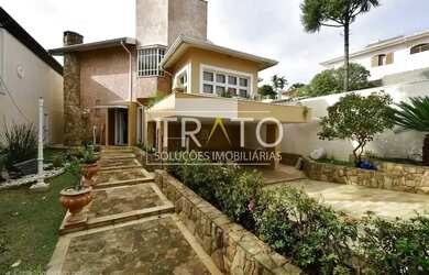 Imagem: A casa possui 4 Dormitórios, 5 Banheiros, 5 Vagas na garagem