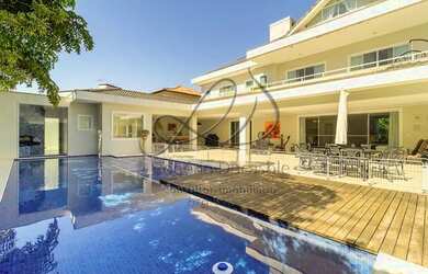 Imagem: A casa em condomínio à venda possui 5 Dormitórios, 5 Banheiros