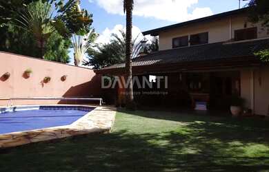 Imagem: A casa em condomínio possui 4 Dormitórios, 5 Banheiros, 2