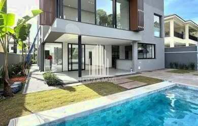 Imagem: A casa em condomínio possui 4 Dormitórios, 5 Banheiros, 5