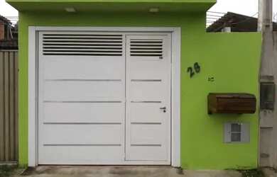 Imagem: A casa possui 2 Dormitórios, 2 Banheiros, 1 Vaga na garagem