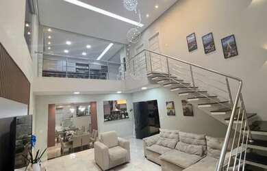 Imagem: A casa possui 4 Dormitórios, 5 Banheiros, 2 Vagas na garagem