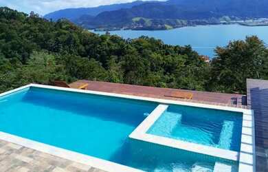 Imagem: A casa possui 1 Dormitório e 1 Vaga na garagem e está localizado