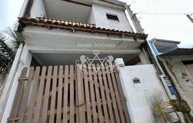 Imagem: A casa possui 2 Dormitórios, 2 Banheiros, 2 Vagas na garagem