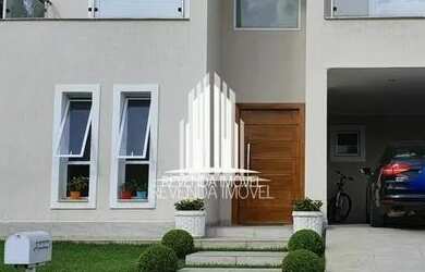 Imagem: A casa em condomínio possui 4 Dormitórios, 5 Banheiros, 4