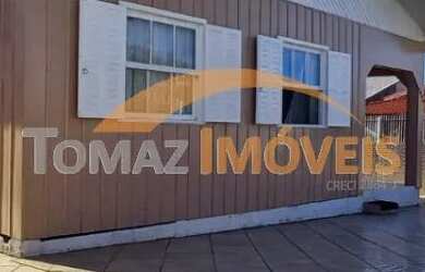 Imagem: A casa possui 4 Dormitórios, 3 Banheiros, 4 Vagas na garagem