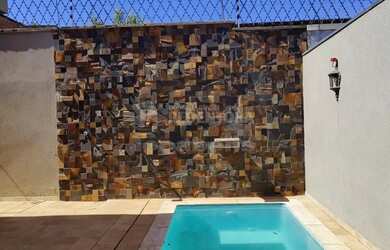 Imagem 4: Recanto do Lago casa com 3 dormitórios e área de lazer com piscina