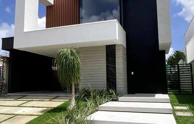 Imagem: A casa em condomínio possui 5 Dormitórios, 5 Banheiros, 2