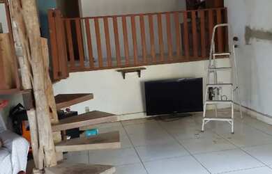 Imagem: A casa possui 3 Dormitórios, 3 Banheiros, 4 Vagas na garagem