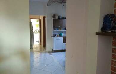 Imagem: A casa possui 2 Dormitórios e 1 Banheiro e está localizado