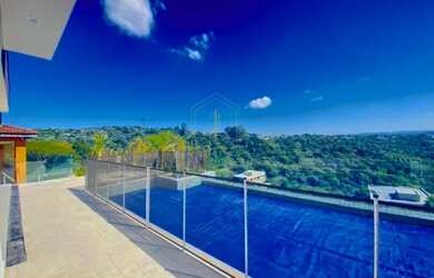 Imagem: A casa em condomínio possui 4 Dormitórios, 5 Banheiros, 5