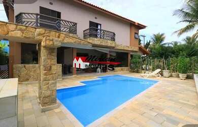 Imagem: A casa em condomínio possui 5 Dormitórios, 5 Banheiros, 4