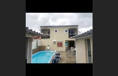 Imagem: A casa possui 5 Dormitórios, 5 Banheiros, 2 Vagas na garagem