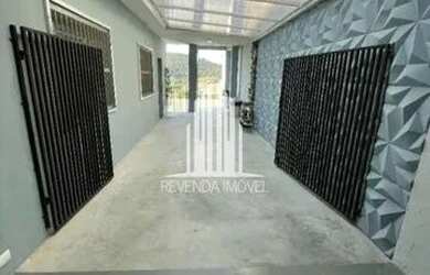 Imagem: A casa possui 3 Dormitórios, 4 Banheiros, 5 Vagas na garagem