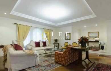 Imagem: A casa possui 5 Dormitórios, 5 Banheiros, 5 Vagas na garagem