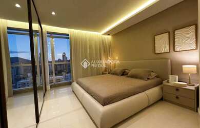 Imagem: O apartamento possui 4 Dormitórios, 5 Banheiros, 3 Vagas na