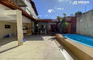 Imagem: A casa possui 2 Dormitórios, 3 Banheiros, 2 Vagas na garagem