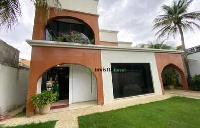 Imagem: A casa possui 5 Dormitórios, 5 Banheiros, 4 Vagas na garagem