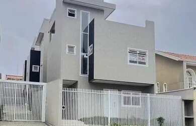 Imagem: A casa possui 3 Dormitórios, 3 Banheiros, 1 Vaga na garagem