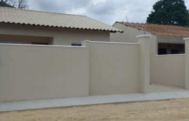 Imagem: A casa possui 2 Dormitórios, 1 Banheiro, 1 Vaga na garagem