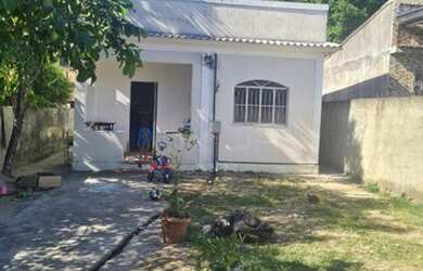 Imagem: A casa possui 3 Dormitórios, 2 Banheiros, 3 Vagas na garagem