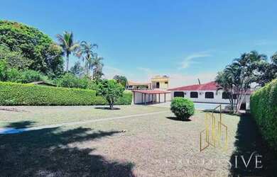 Imagem: A casa possui 5 Dormitórios, 5 Banheiros, 5 Vagas na garagem