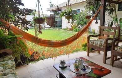 Imagem: A casa possui 2 Dormitórios e está localizado em Praia do