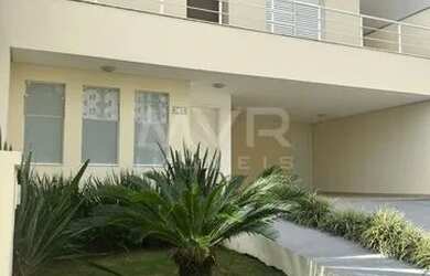 Imagem: A casa possui 3 Dormitórios, 5 Banheiros, 4 Vagas na garagem