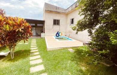 Imagem: A casa possui 2 Dormitórios, 2 Banheiros, 3 Vagas na garagem