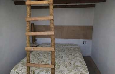 Imagem: A casa possui 2 Dormitórios, 3 Banheiros, 4 Vagas na garagem