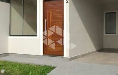 Imagem: A casa possui 3 Dormitórios, 2 Banheiros, 1 Vaga na garagem