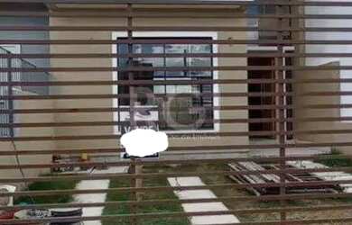 Imagem: A casa possui 3 Dormitórios, 3 Banheiros, 2 Vagas na garagem