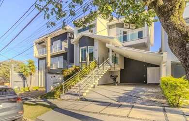 Imagem: A casa em condomínio possui 3 Dormitórios, 4 Banheiros, 4