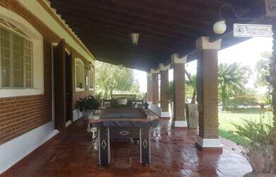 Imagem 13: Casa de condomínio. Piscina, Churrasqueira, VarandaeLareira