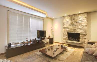 Imagem: A casa possui 3 Dormitórios, 4 Banheiros, 3 Vagas na garagem