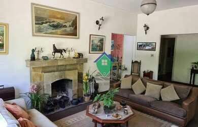 Imagem: A casa possui 3 Dormitórios, 5 Banheiros, 5 Vagas na garagem