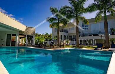 Imagem: A casa em condomínio possui 5 Dormitórios, 5 Banheiros, 5