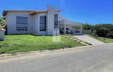 Imagem: A casa possui 4 Dormitórios, 5 Banheiros, 4 Vagas na garagem