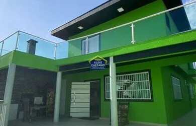 Imagem: A casa possui 5 Dormitórios, 5 Banheiros, 4 Vagas na garagem