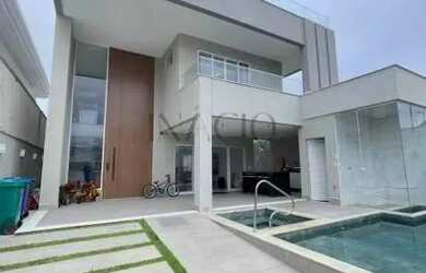 Imagem: A casa em condomínio possui 5 Dormitórios, 5 Banheiros, 3