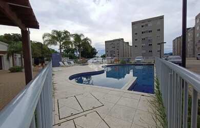 Imagem: O apartamento possui 2 Dormitórios, 1 Banheiro, 1 Vaga na garagem