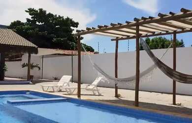 Imagem: A casa possui 5 Dormitórios, 5 Banheiros, 5 Vagas na garagem