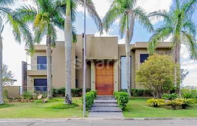 Imagem: A casa em condomínio possui 5 Dormitórios, 5 Banheiros, 5