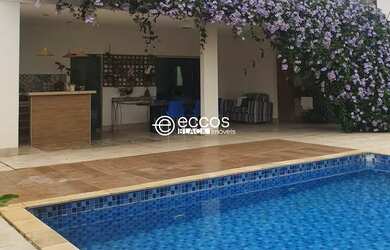 Imagem: A casa possui 3 Dormitórios, 4 Banheiros, 4 Vagas na garagem