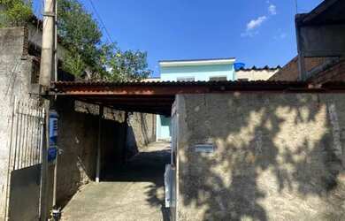 Imagem: A casa possui 2 Dormitórios, 1 Banheiro, 3 Vagas na garagem