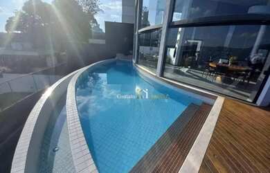 Imagem: A casa possui 3 Dormitórios, 5 Banheiros, 5 Vagas na garagem