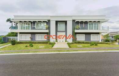 Imagem: A casa em condomínio possui 4 Dormitórios, 5 Banheiros, 5