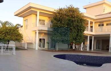 Imagem: A casa em condomínio possui 5 Dormitórios, 5 Banheiros, 5